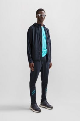 Pantalones de ch&aacute;ndal regular fit con dise&ntilde;o reflectante decorativo, Azul oscuro