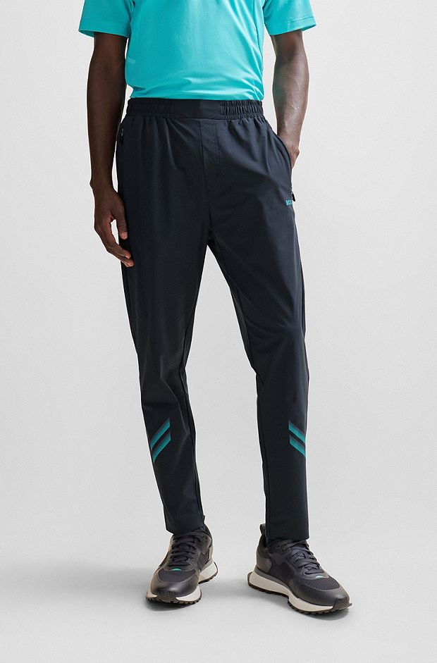 Pantalones de chándal regular fit con diseño reflectante decorativo, Azul oscuro