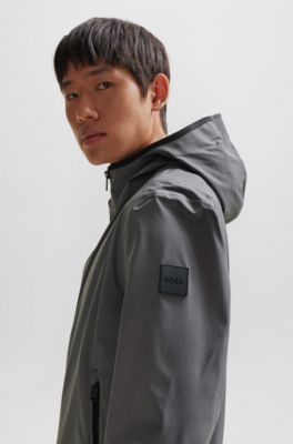 BOSS - Water-repellent softshell jacket with logo badge