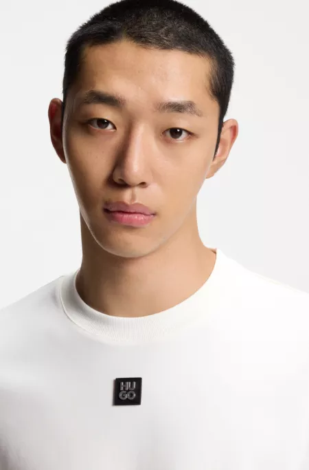 Interlock-cotton T-shirt with metallic stacked-logo badge