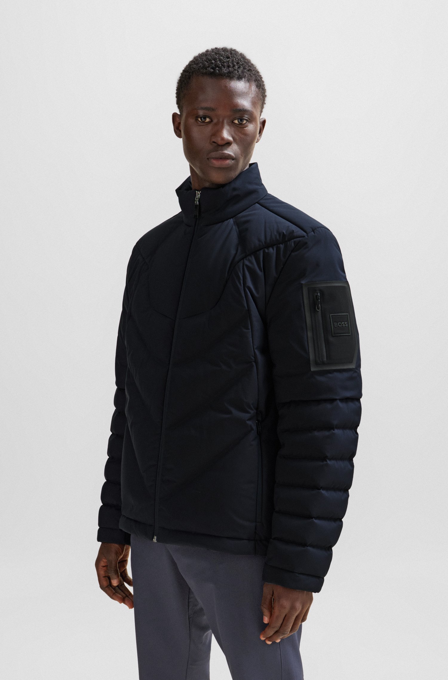 Down-filled jacket with water-repellent finish