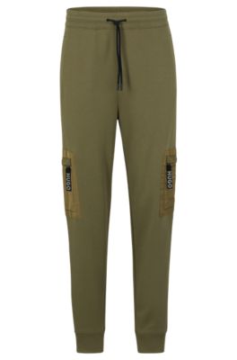 HUGO - Relaxed-fit tracksuit bottoms with cargo pockets