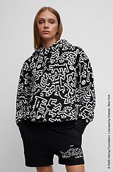 Sweat à capuche BOSS x Keith Haring en coton avec motif artistique spécial, Noir