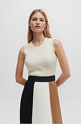 Sleeveless knitted top with ribbed structure, White
