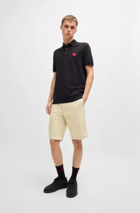 Regular-fit shorts with slim leg and buttoned pockets