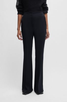 Regular-fit trousers in stretch twill with flared leg