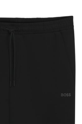 Stretch-cotton track pants with logo print, Black