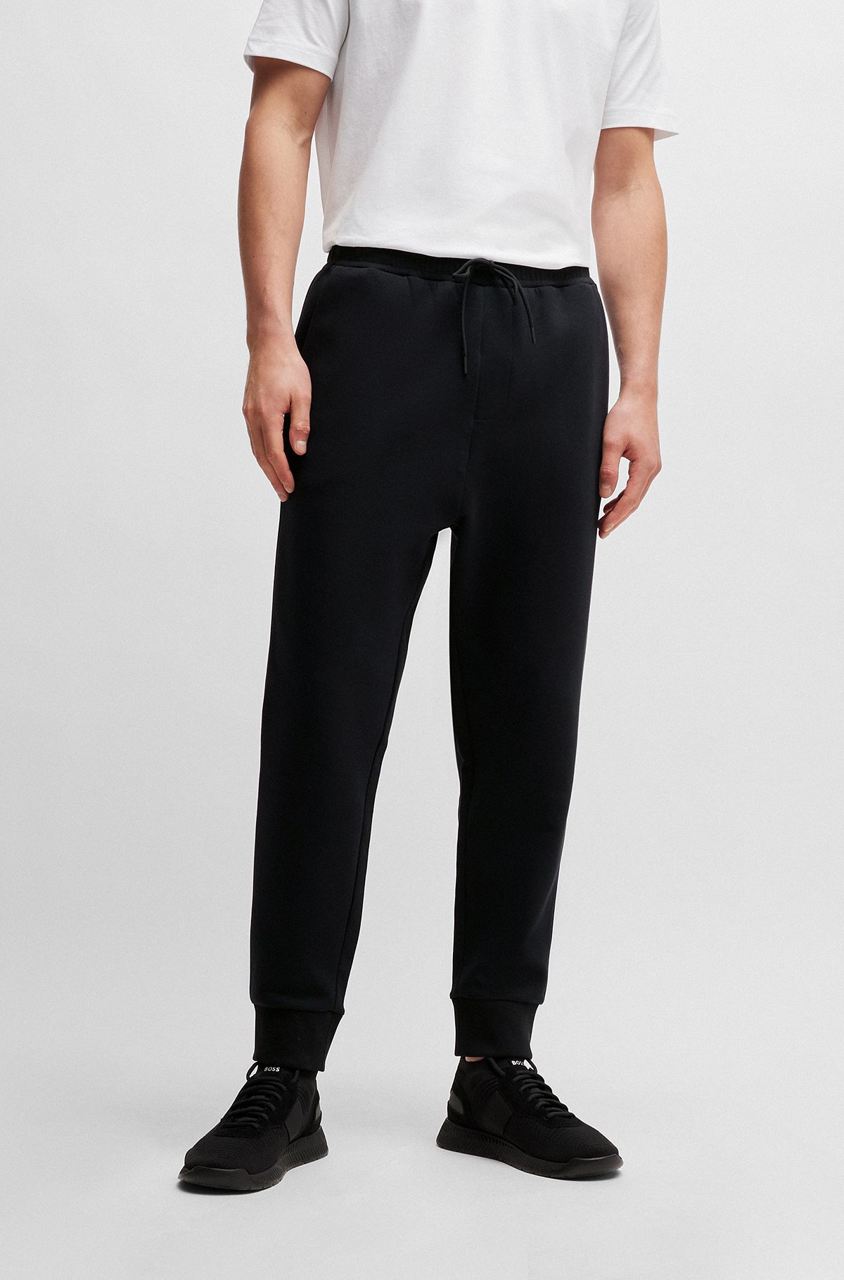 Pantalones de chándal de algodón elástico con logo estampado, Negro