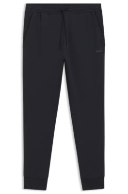 Stretch-cotton track pants with logo print, Dark Blue