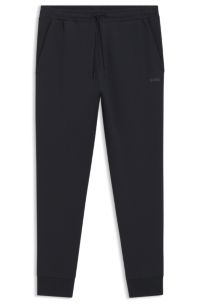 BOSS - Stretch-cotton tracksuit bottoms with logo print
