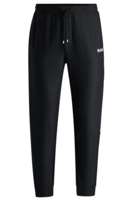 Shop Hugo Boss Boss X Matteo Berrettini Tracksuit Bottoms With Contrast Tape And Branding In Black