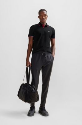 Polo slim fit de algod&oacute;n el&aacute;stico con detalles de la marca, Negro