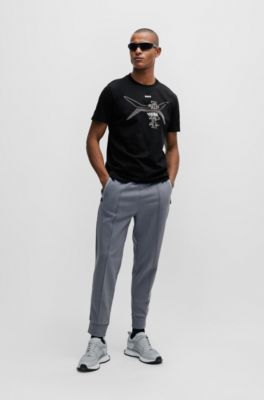 T-shirt &agrave; col rond en jersey de coton, avec motif artistique de la saison, Noir