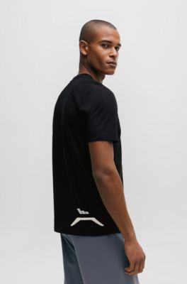 T-shirt &agrave; col rond en jersey de coton, avec motif artistique de la saison, Noir