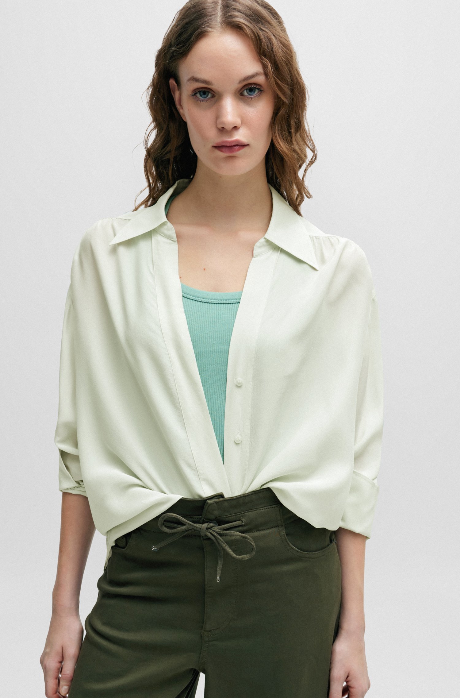 Relaxed-fit blouse with concealed placket and point collar
