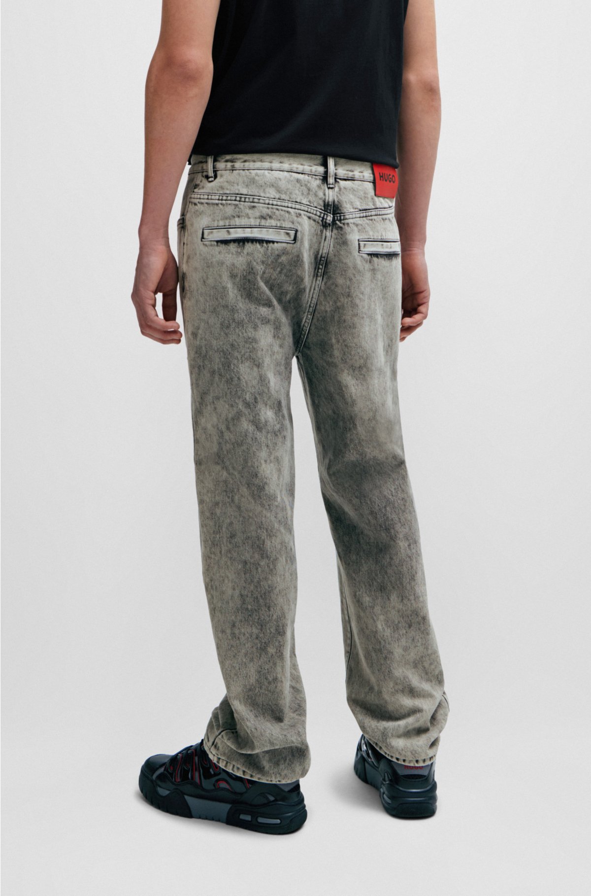 HUGO - Loose-fit jeans in bleach-wash black rigid denim