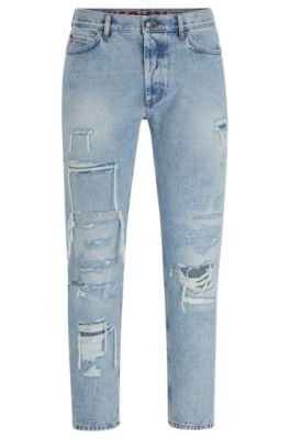 HUGO - Tapered-fit jeans in blue denim with destroyed details