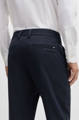 Slim-fit trousers in structured performance-stretch material, Dark Blue