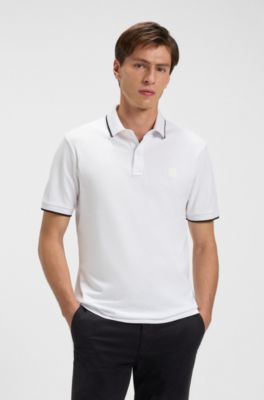 Polo slim fit de piqu&eacute; de algod&oacute;n el&aacute;stico, Blanco