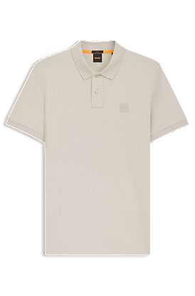Polo slim fit de algodón elástico con parche de logo