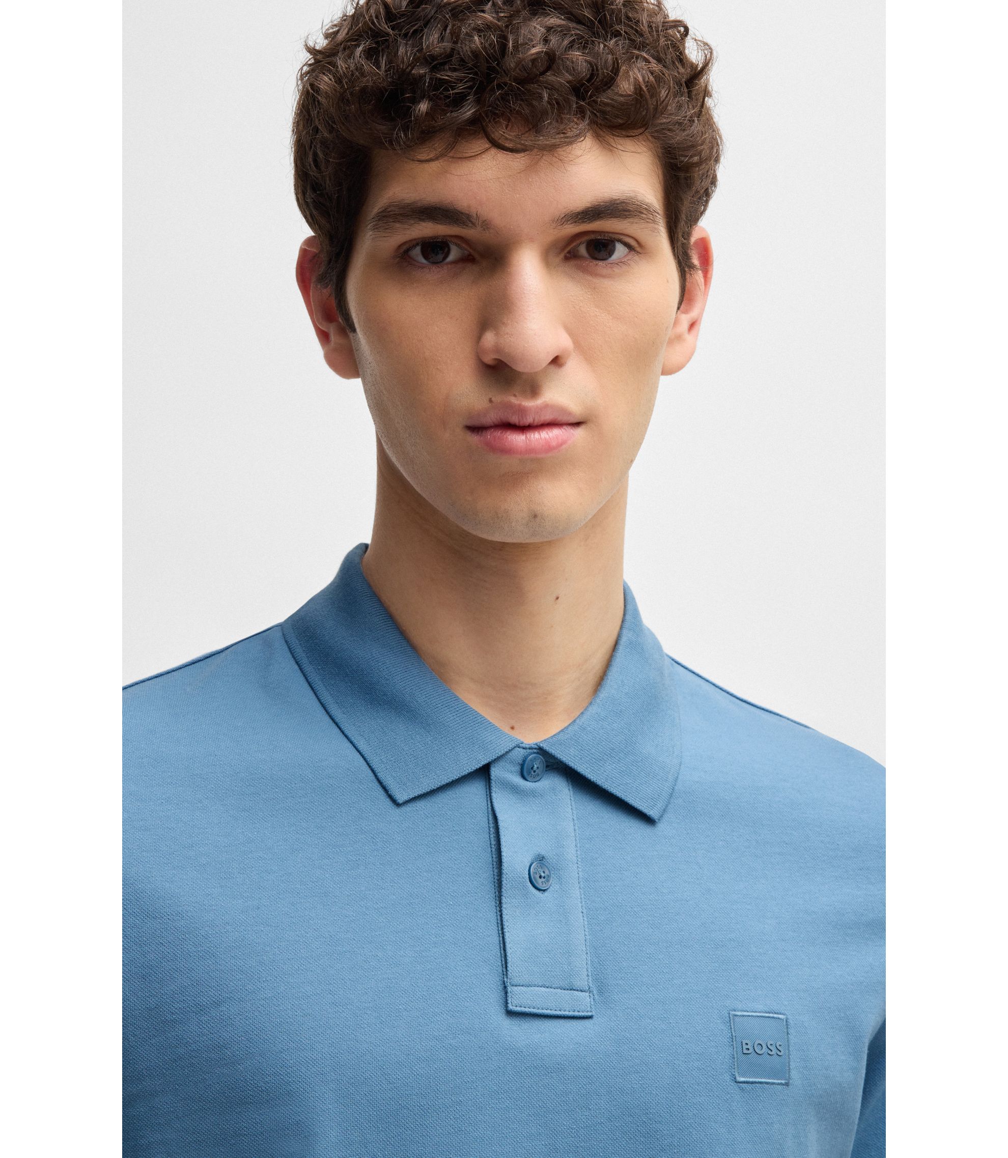 BOSS - Logo-patch slim-fit polo shirt in stretch cotton
