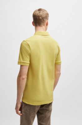 Polo slim fit de algod&oacute;n el&aacute;stico con parche de logo, Amarillo