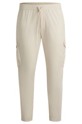 Hugo Boss Tapered-fit Trousers In Easy-iron Stretch Poplin In White