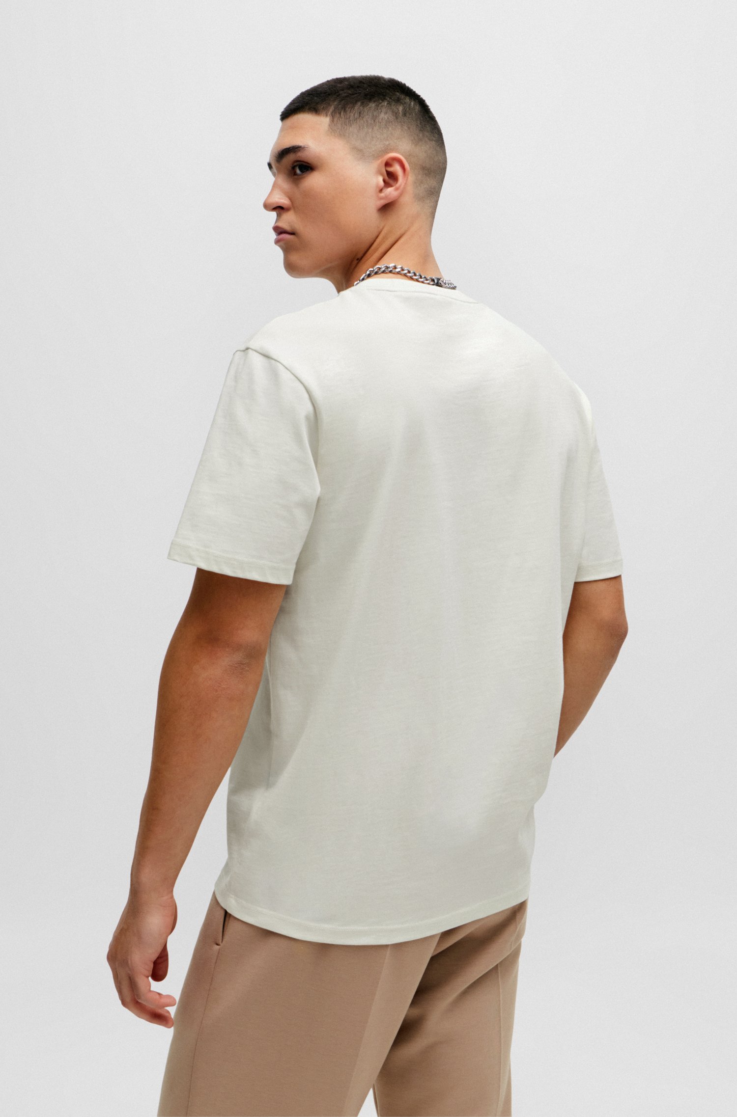 Camiseta relaxed fit de algodón con ilustración espray