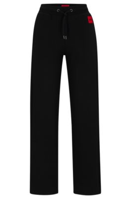 Shop Hugo Tracksuit Bottoms With Logo Label In Black