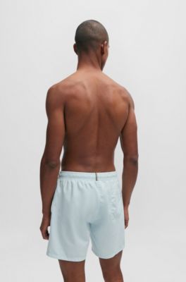 Ba&ntilde;ador tipo shorts con forro integral y logo estampado, Celeste