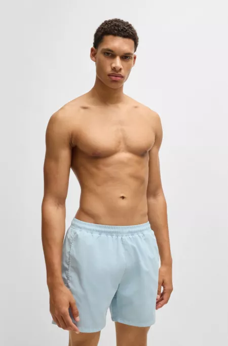 Fully lined swim shorts with logo print