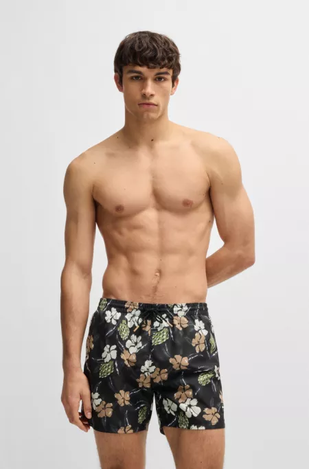 Quick-dry swim shorts with all-over print
