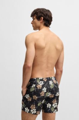 Quick-dry swim shorts with all-over print
