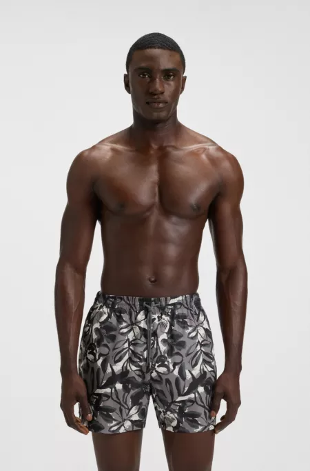 Quick-dry swim shorts with all-over print