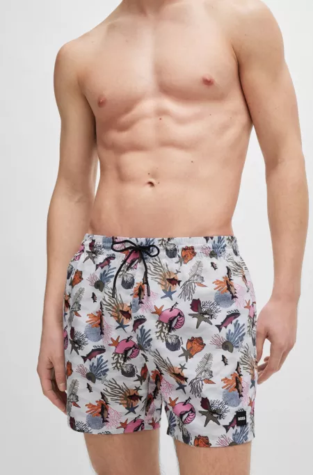 Quick-dry swim shorts with all-over print