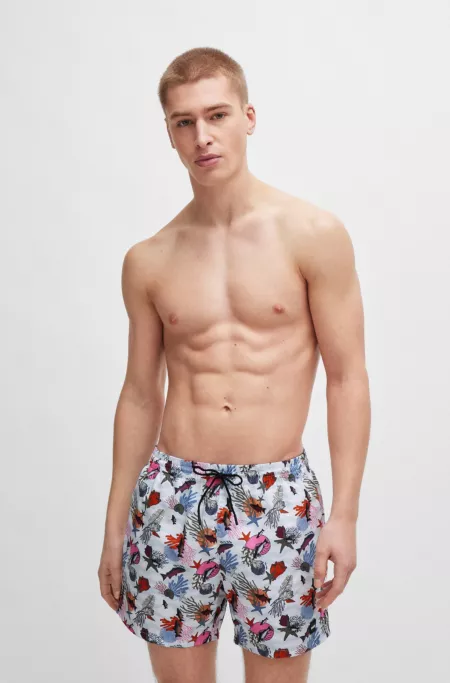 Quick-dry swim shorts with all-over print