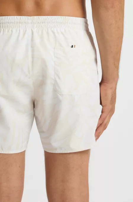 Quick-dry swim shorts with all-over print