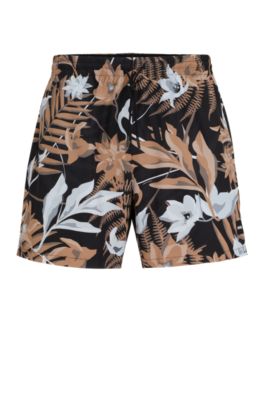 Shop Hugo Boss Tropical-print Quick-drying Swim Shorts With Logo Badge In Beige