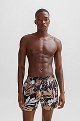 Tropical-print quick-drying swim shorts with logo badge, Beige