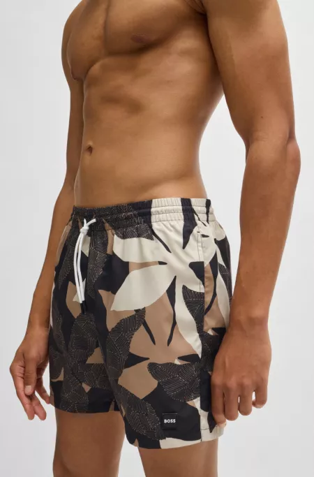 Quick-dry swim shorts with all-over print