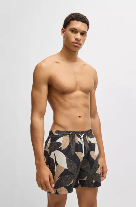 Quick-dry swim shorts with all-over print