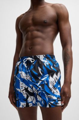 Quick-dry swim shorts with all-over print, Blue