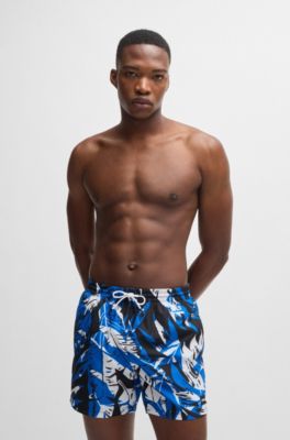 Quick-dry swim shorts with all-over print, Blue