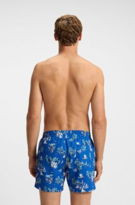 Quick-dry swim shorts with all-over print, Blue