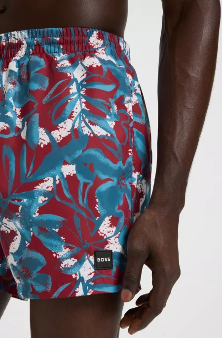 Quick-dry swim shorts with all-over print