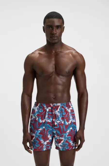 Quick-dry swim shorts with all-over print
