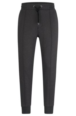 BOSS - Regular-fit tracksuit bottoms in mouliné French terry