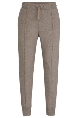 BOSS - Regular-fit tracksuit bottoms in mouliné French terry