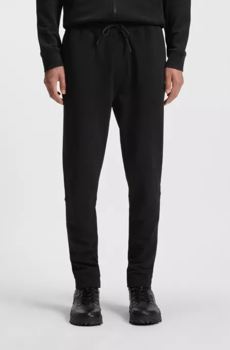 Logo-patch tracksuit bottoms in cotton terry