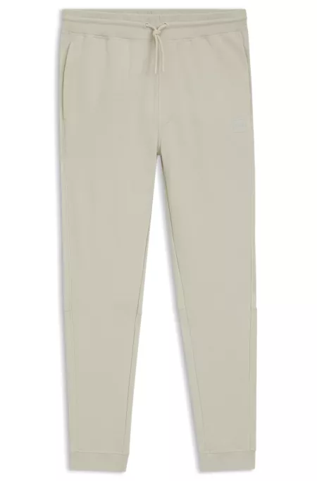 Cotton-terry sweatpants with logo patch